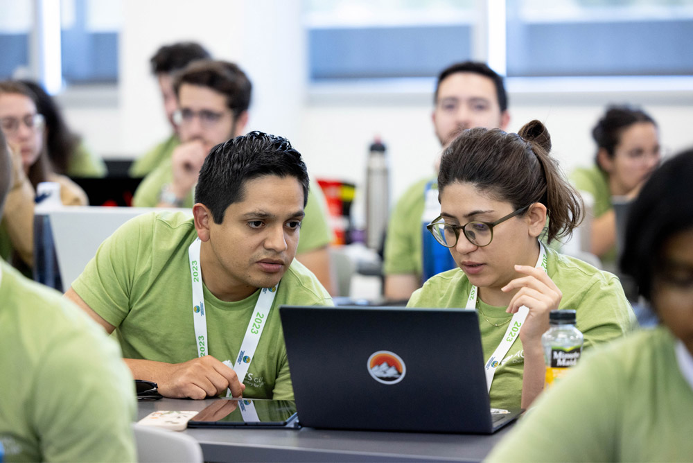 Students looing at a laptop