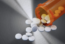 Picture by Canva, steel background w/ pharmaceuticals 