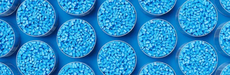 Blue plastic pellets arranged in circles