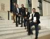 Award winners stand in front of the National Academy of Sciences
